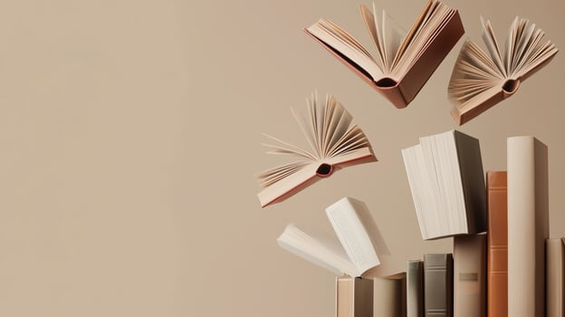 Books appear to float above a stack, creating a whimsical display against a neutral background in a creative art piece photo