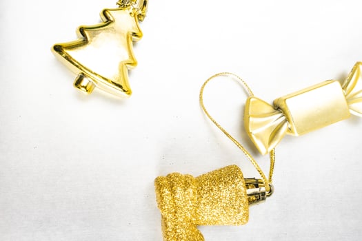 Golden Christmas decoration on a white background. Christmas decoration. photo