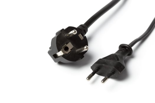 Black power cable with plug and socket isolated on white photo