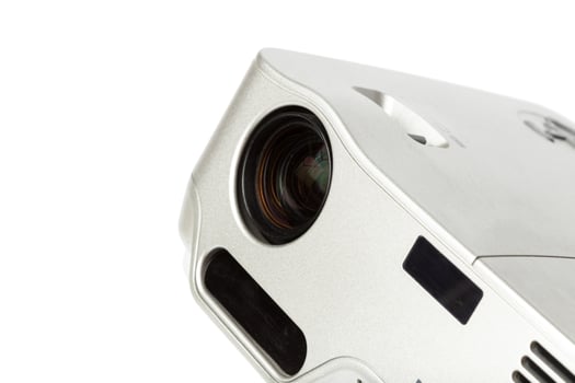 Projector multimedia silver colour on white background photo