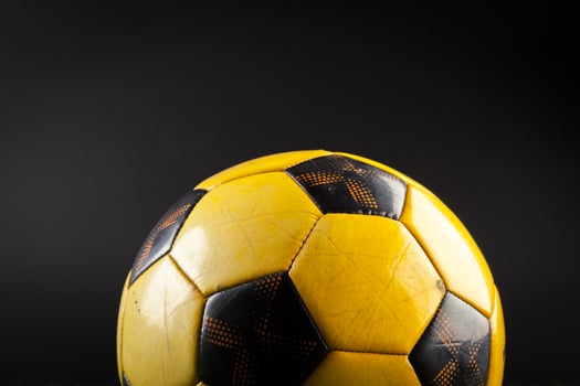 soccer ball on the green field photo