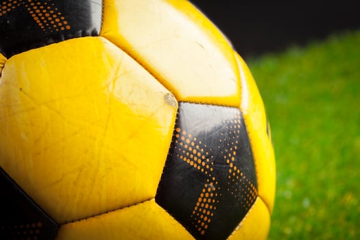soccer ball on the green field photo