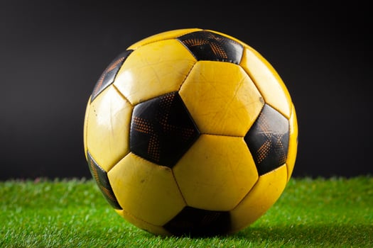 soccer ball on the green field photo
