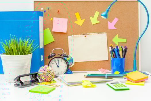 Work place of a creative person with a variety of colorful stationery objects photo