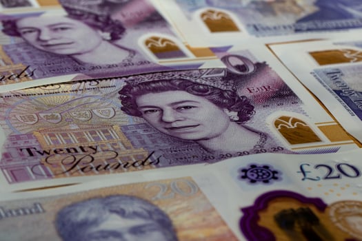 A pile of british pound notes photo