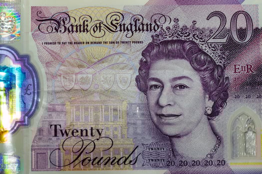 A twenty pound note with a portrait of queen elizabeth on it photo