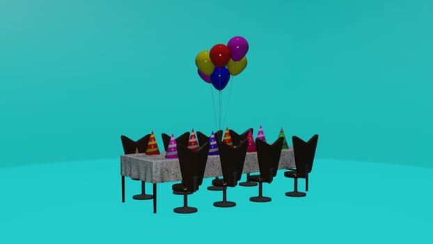 A table with balloons and chairs photo