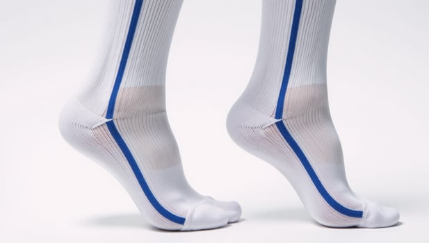 White socks featuring blue stripes Simple concise photo