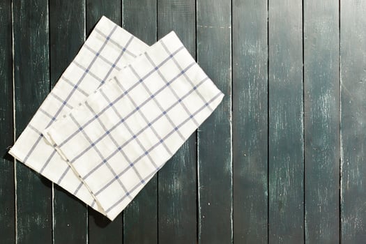 tablecloth on black wooden table photo