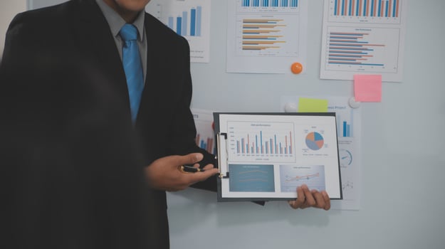 Audit concept,Administrator business man financial inspector and secretary making report calculating balance. Internal Revenue Service checking document. photo
