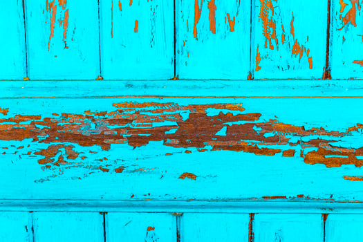 Turquoise wooden door texture frame beautifully painted in Costa Rica. photo