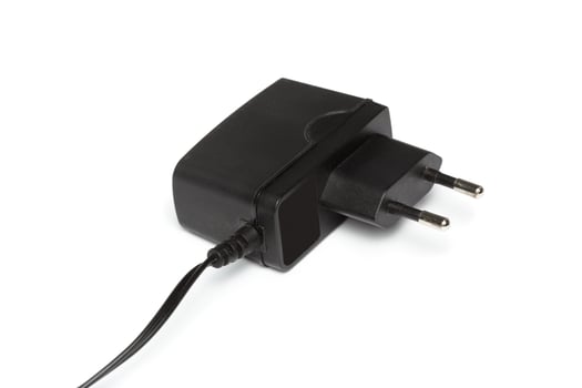 Electric power adapter isolated on white background photo