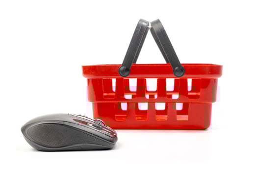 Internet shopping concept. Computer mouse and shopping cart photo