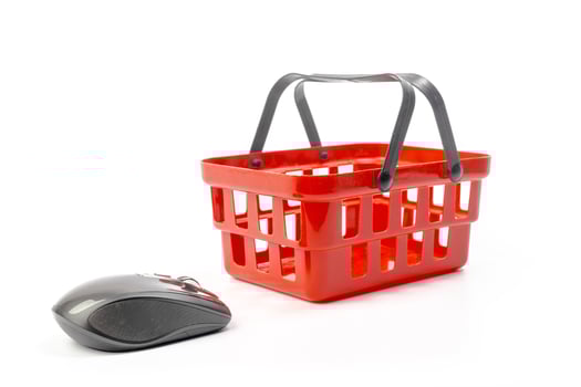 Internet shopping concept. Computer mouse and shopping cart photo