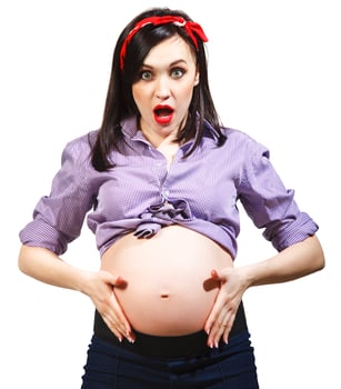 Happy young funny pregnant woman photo