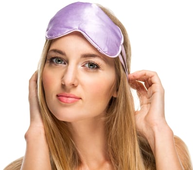 Portrait of a woman wearing a sleeping mask photo