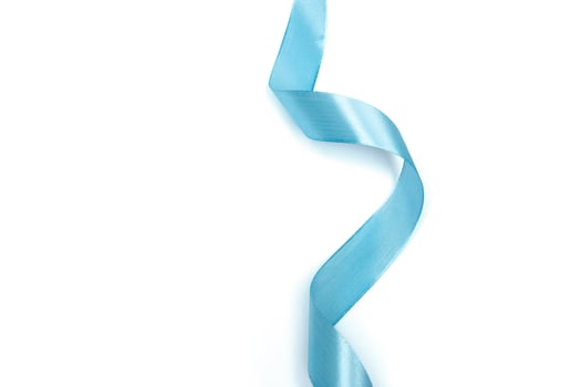 Shiny blue ribbon isolated on white photo