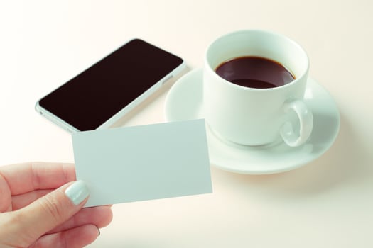 Blank card with coffee cup with space photo