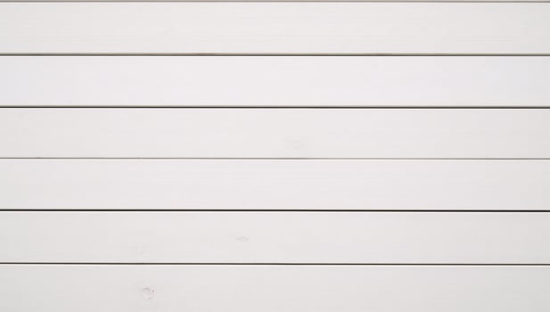 Rustic white wooden background with classic grunge texture ideal for various design photo and creative uses