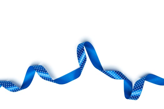 Shiny blue ribbon isolated on white photo
