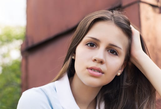 Portrait of a beautiful teen girl in sunset light photo