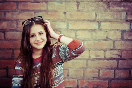 Close up portrait of a beautiful cute teen girl smilling photo