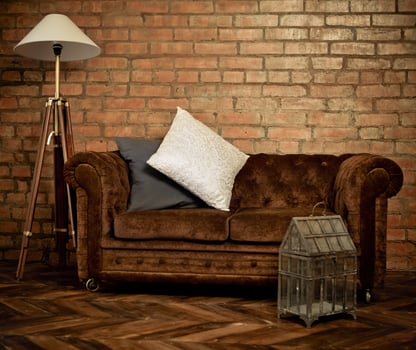 Interior of loft with velvet sofa photo