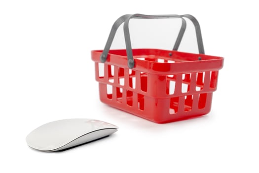 Internet shopping concept. Computer mouse and shopping cart photo