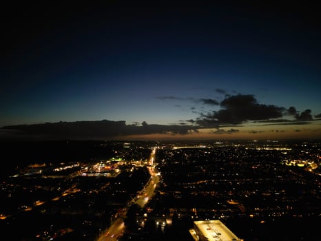 Most Beautiful High Angle View of Illuminated Luton City of England UK at Just After Sunset and Full Moon Night. Aerial Footage Was Captured with Drone's Camera on October 17th, 2024 photo