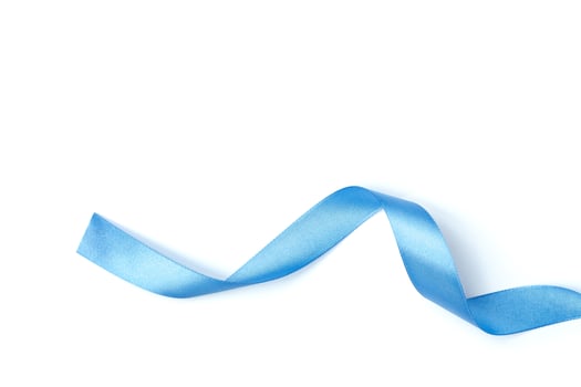 Shiny blue ribbon isolated on white photo
