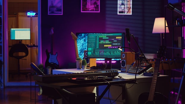 Empty home studio filled with recording and mixing instruments, electronic devices and daw software used for music production and acoustics. Modern bright space with soundboard panel. Camera A. photo