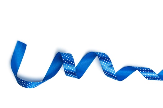 Shiny blue ribbon isolated on white photo
