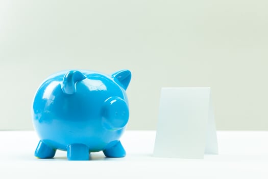 Blue piggy bank or money box photo