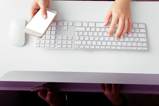 Hands of an office woman typing photo