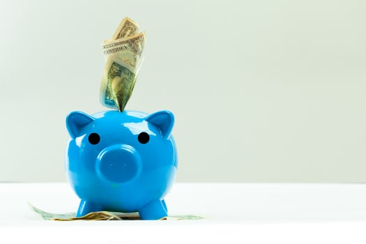 Blue piggy bank or money box photo