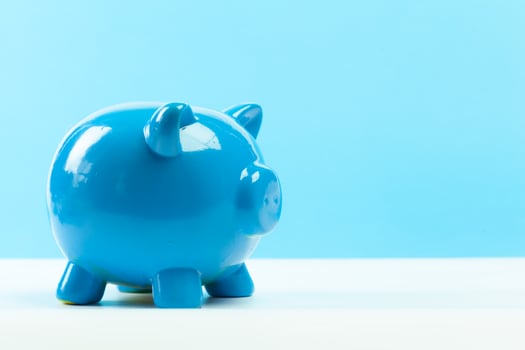 Blue piggy bank or money box photo