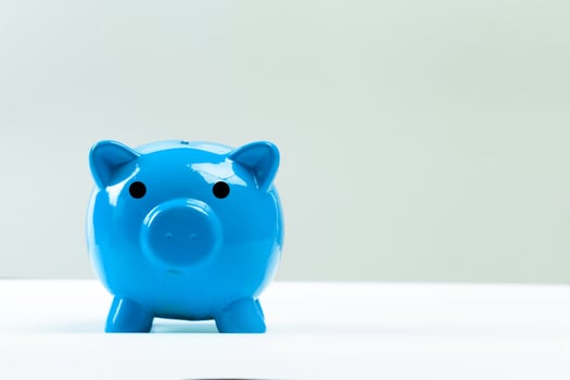 Blue piggy bank or money box photo