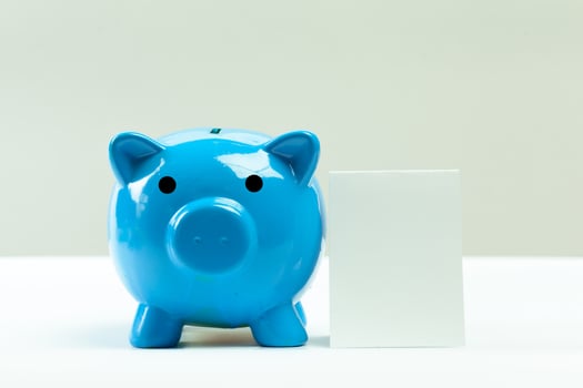 Blue piggy bank or money box photo