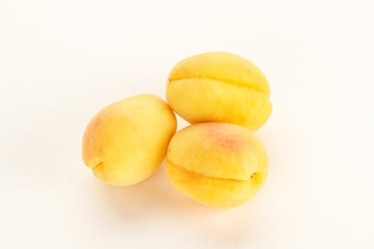 Ripe sweet juicy apricot heap photo