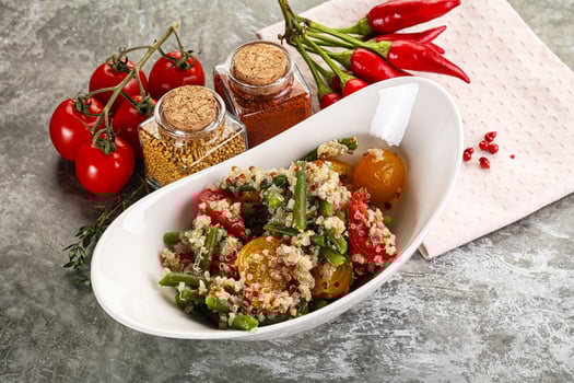 Vegan boiled quinoa with vegetables photo