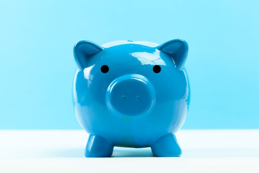 Blue piggy bank or money box photo