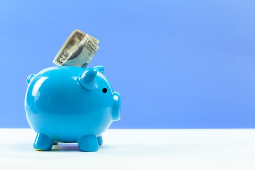 Blue piggy bank or money box photo