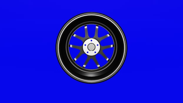 A black wheel on a blue background photo