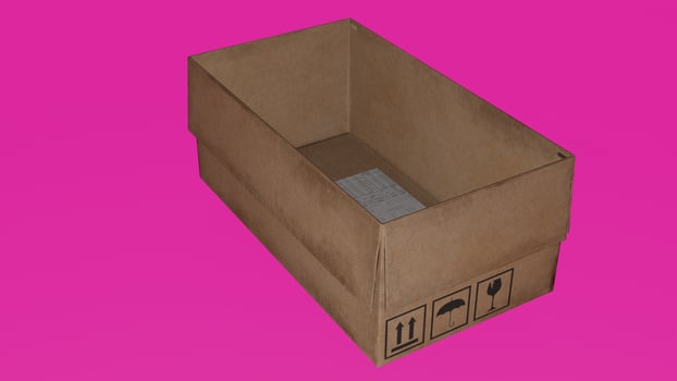 A cardboard box on a pink background photo