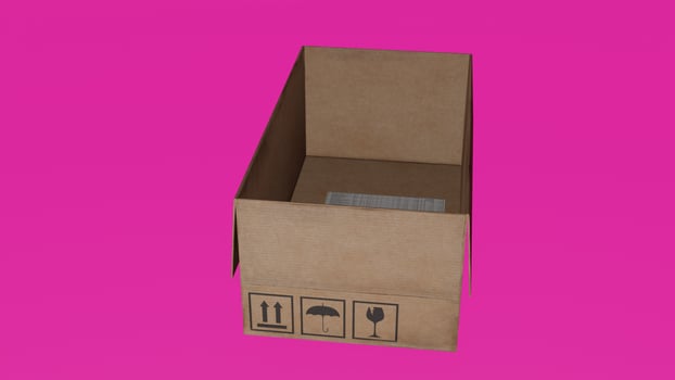 A cardboard box on a pink background photo