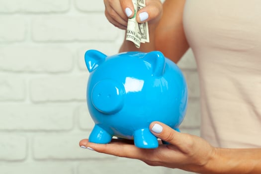 Blue piggy bank or money box photo