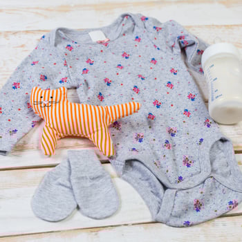 set of fashion trendy clothes and kids stuff for little baby girl photo