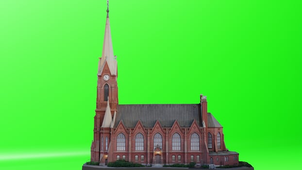 A model of a church on a green screen photo