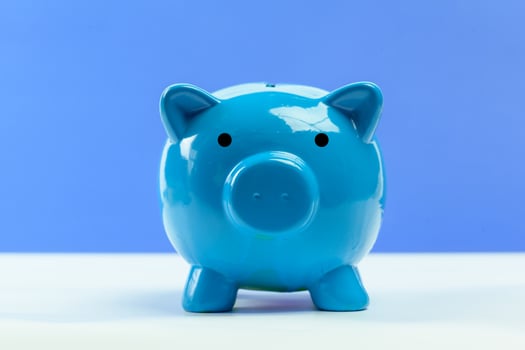 Blue piggy bank or money box photo