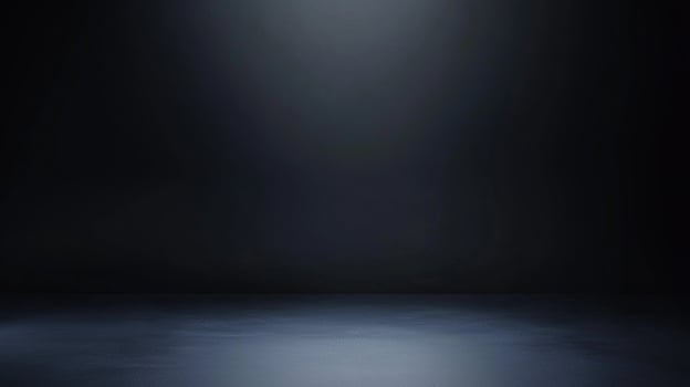 An empty room with a spotlight shining on it photo